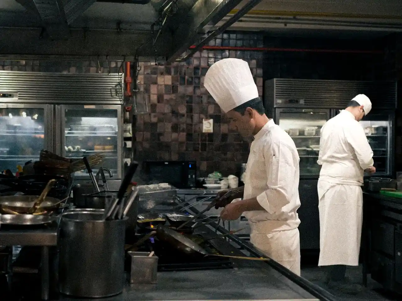 Culinary team working in harmony in a modern kitchen