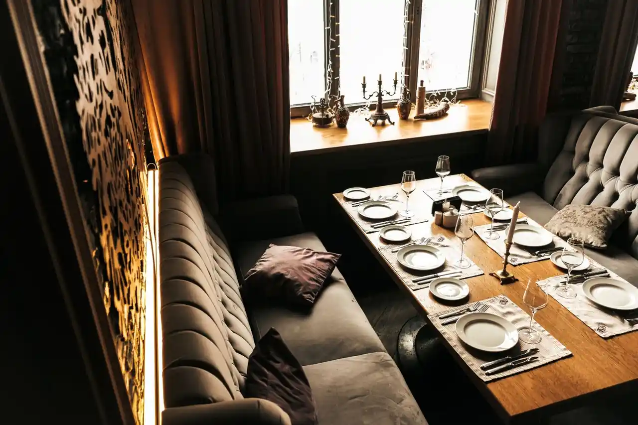 Celebration setup with elegant sofas and table